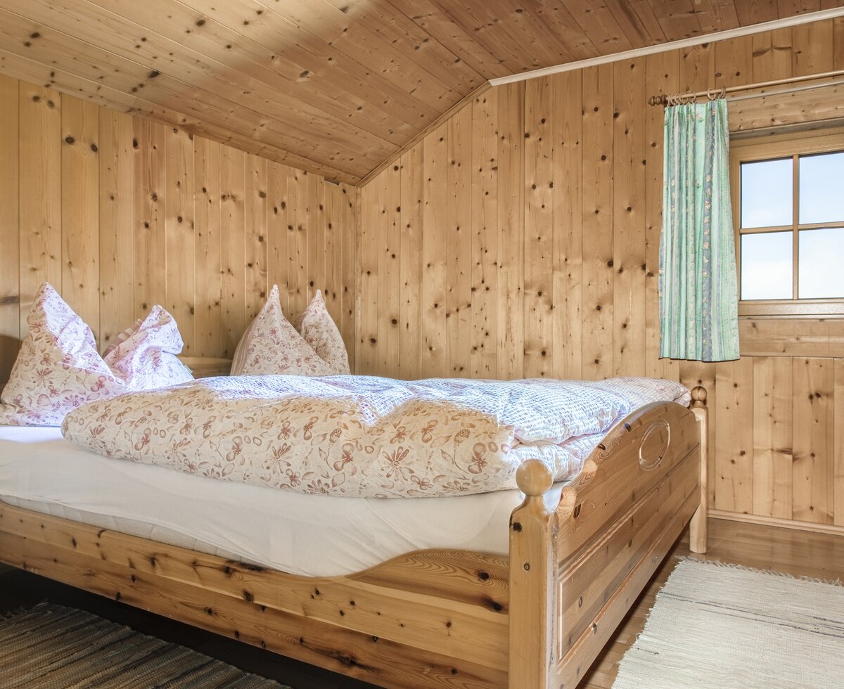 Schlafzimmer auf der Ebenhütte | © Urlaub am Bauernhof im SalzburgerLand / Bernd Suppan